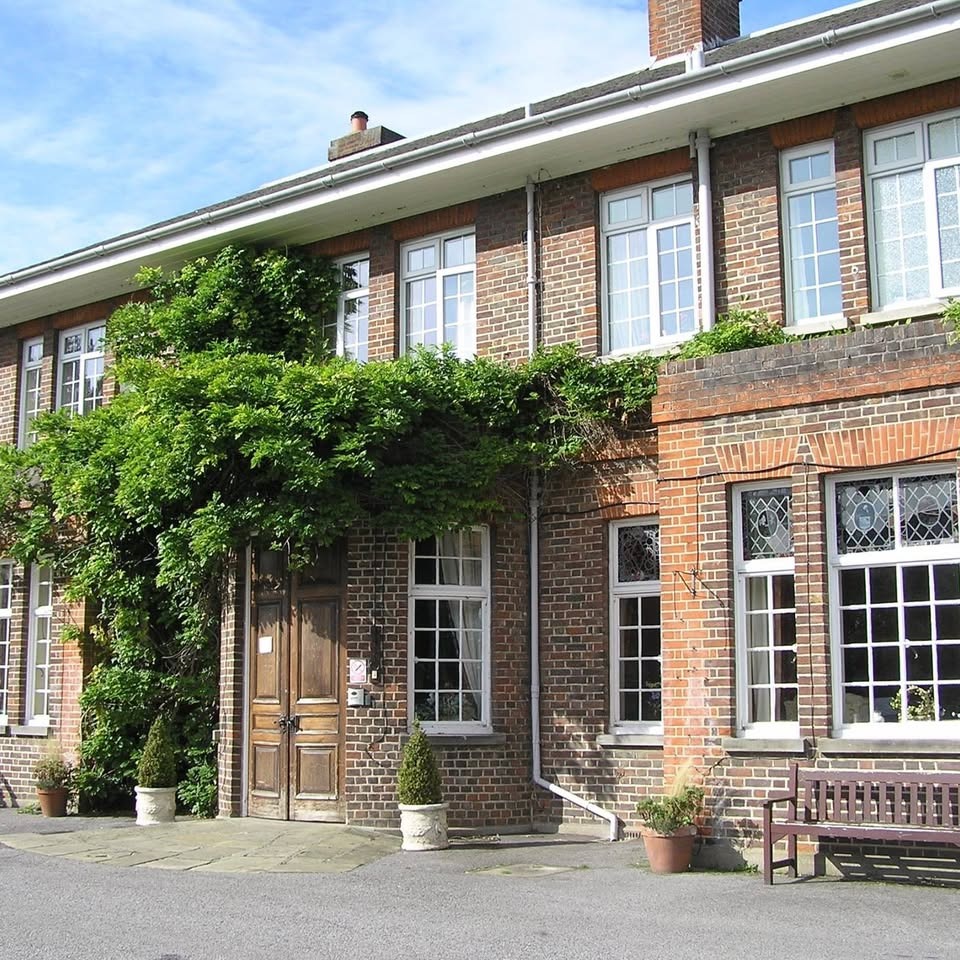 Stewton House Georgian exterior draped in climbing wisteria