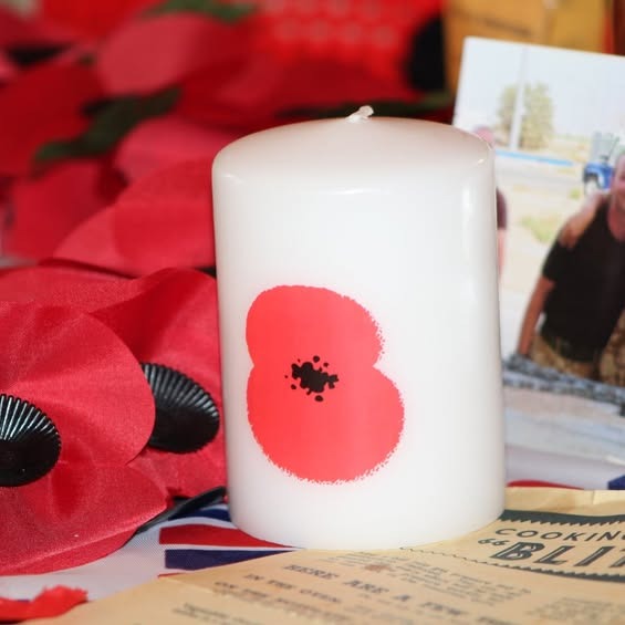 Remembrance poppy candle display in the manor lounge