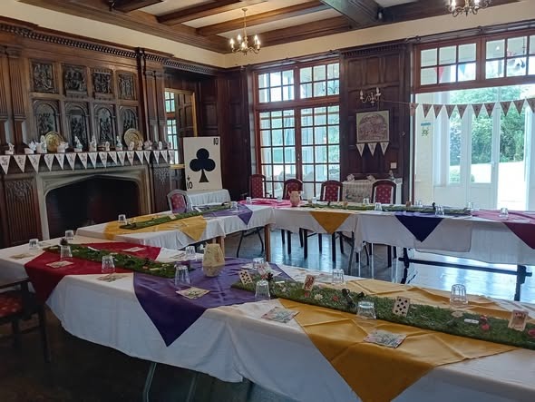 Historic oak-paneled hall and carved stone fireplace